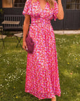 Maxikjole med Blomsterprint | Draperet Talje | Elegant og Sommerlig Lyserød / L Beklædning og tilbehør > Tøj > Kjoler